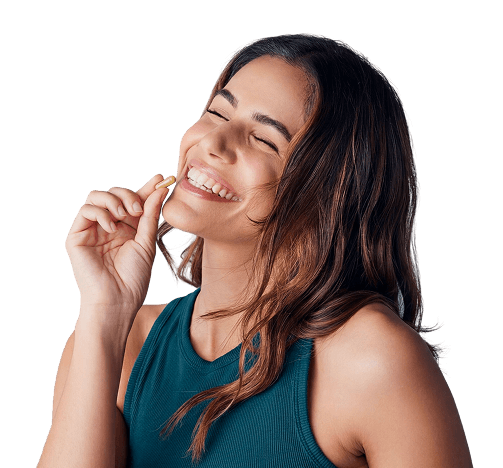 Woman holding an Arka supplement capsule
